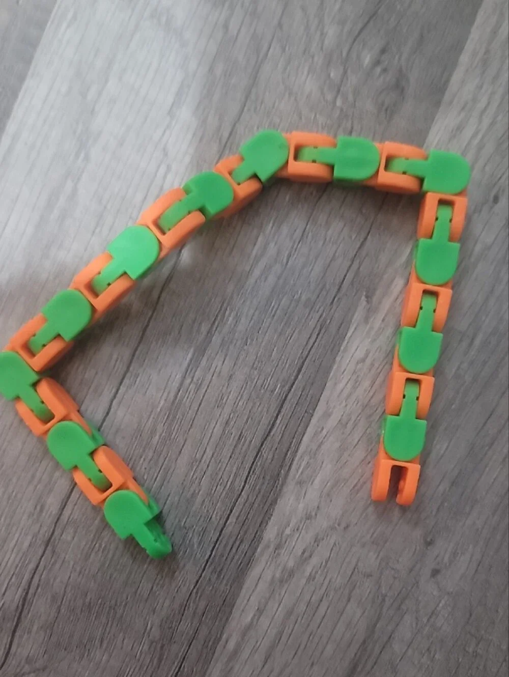 Fidget Set Includes 12 Monkey Noodles,  1 Zipper Bracelet, And 1 Wacky Track